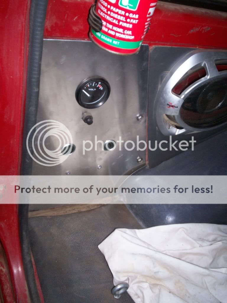 The fuse box is behind the panel, as it only has two bolts holding it on it is quick enough to take off and change the fuse.